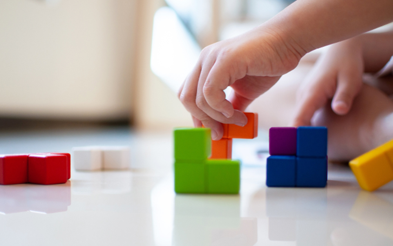 child playing with blocks