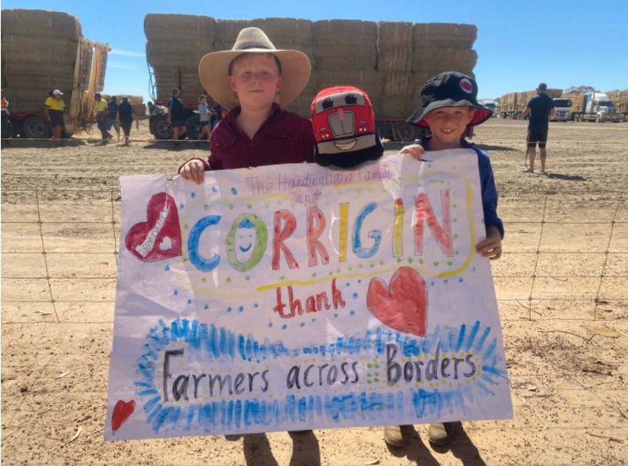 Kids with thank you sign